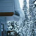 USA ID McCall 2001JAN13 011  For some unknown reason, I think it's cool that the snow slides off the roof and then curls under the eaves. : 2001, 2001 - 2nd Annual Bed & Sled, Idaho, January, McCall, North America, USA