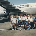 AUS NT Darwin 1990SEPT28 WRLFC WGT 006  STANDING - Phil "Philthy" Wilkins, Dowlo, Powelly, Simon "Reet" Petite, Paul "Bushy" Bushette, Harry "Uncle Arthur" Stubbins, Thomas Keith "Darky" Darke, Ian "Rama Bali" Williams, Roy the Boy, Manu, Putahna, Bulldog, Fitzy, Mary & Michael "Griffo" Griffin.   KNEELING - John "Coxy" Cox & Craig "Lambok Miniani" Lambley. : 1990, 1990 World Grog Tour, Australia, Darwin, NT, Rugby League, September, Wests Rugby League Football Club